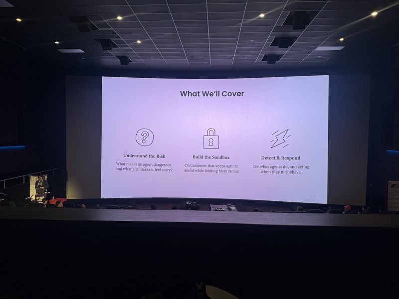 Slide: What We Cover overview listing three pillars: Understand the Risk, Build the Sandbox, and Detect and Respond